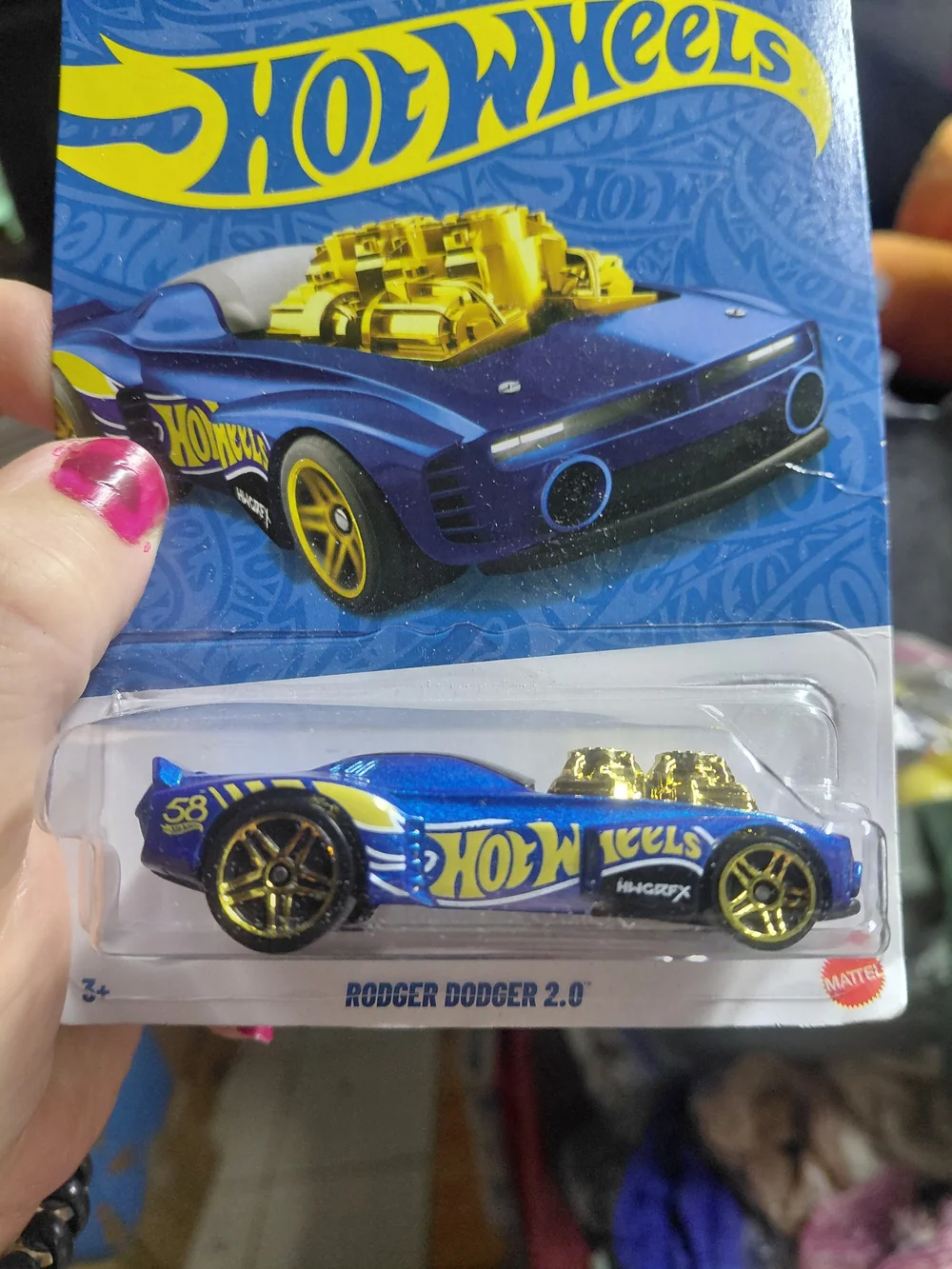 the Hot Wheels Rodger Dodger 2.0 from the 2026 58th Anniversary Blue and Gold se